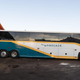 Image for article titled This Beautiful Coach Bus RV Has A Basement Bedroom And A Full Kitchen